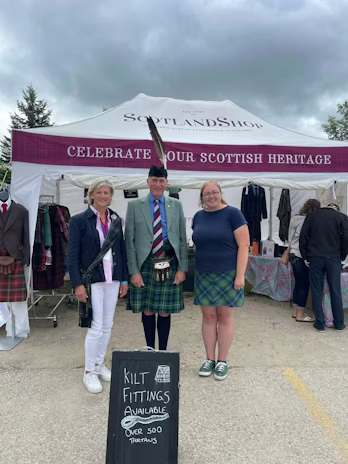 Sir Adam Fergusson with his wife at Scotland Shop tent at Fergus Festival